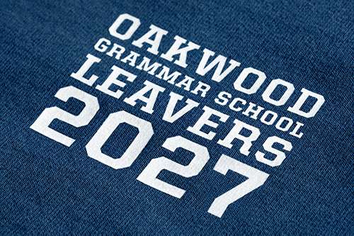 close-up photo of a printed school leavers hoodie design on the front left chest area