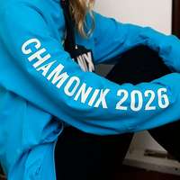 The ski resort destination printed down the sleeve of a hoodie